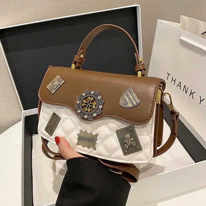 Discover Elegance: Imported PU Leather Sling Bag